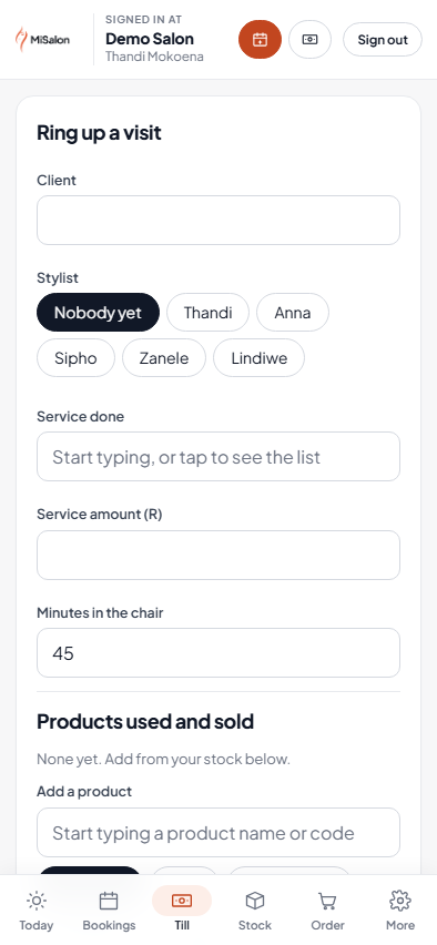 Ringing up a visit on a phone, with products suggested for the client